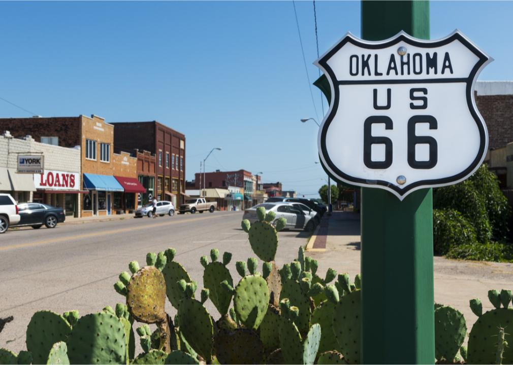Historic Route 66 sign in small town.