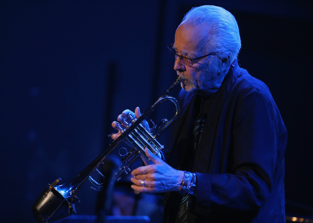 Herb Alpert performs onstage.