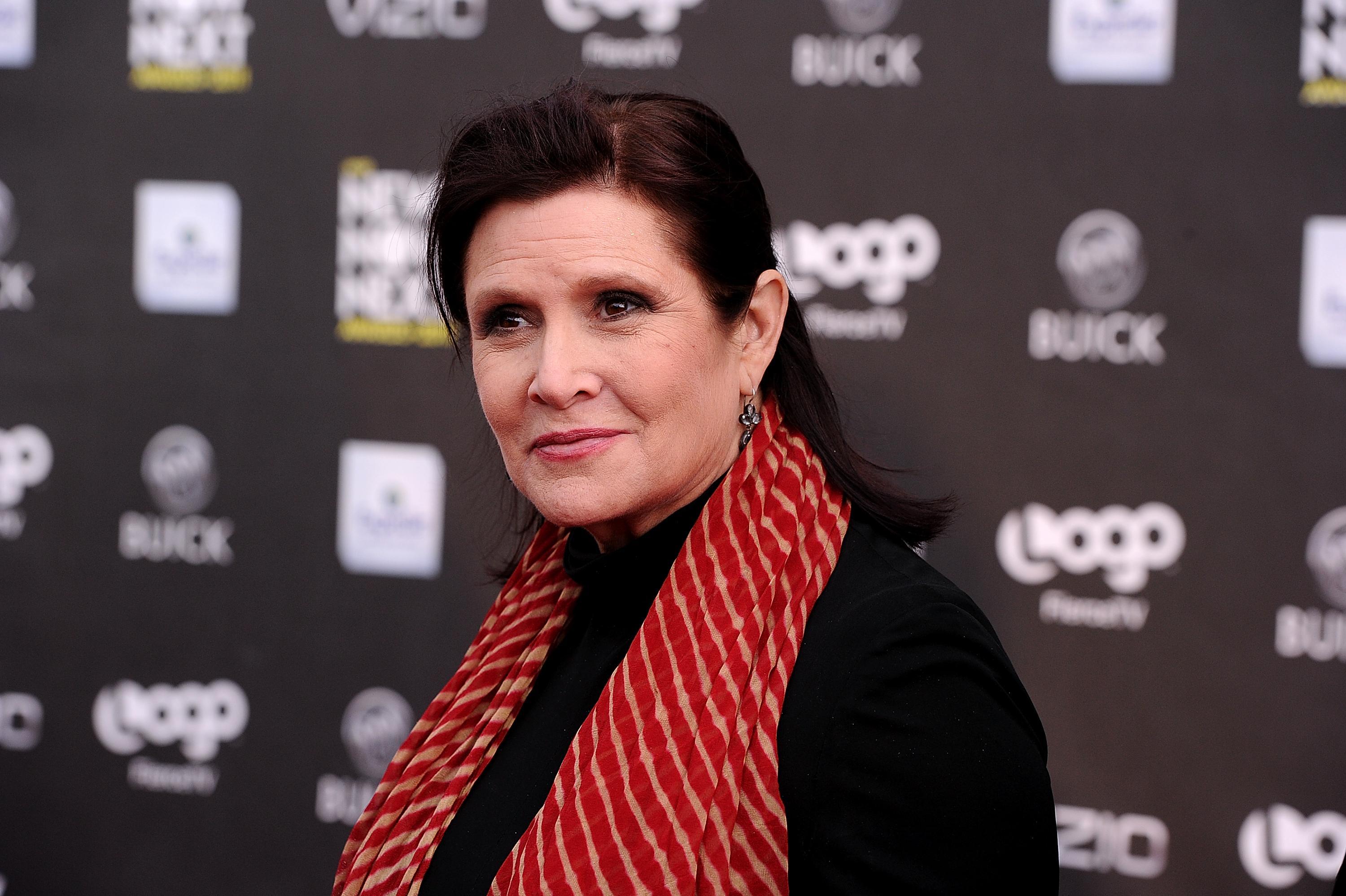 Carrie Fisher attends event.