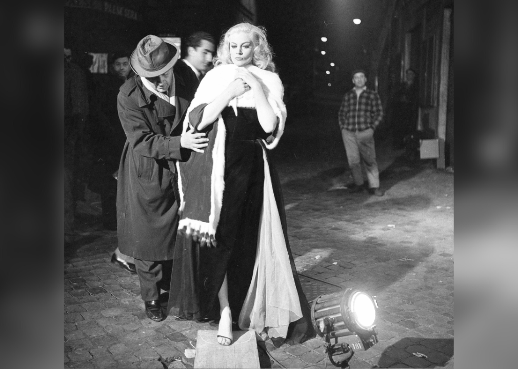 Federico Fellini directing Anita Ekberg on the set of 