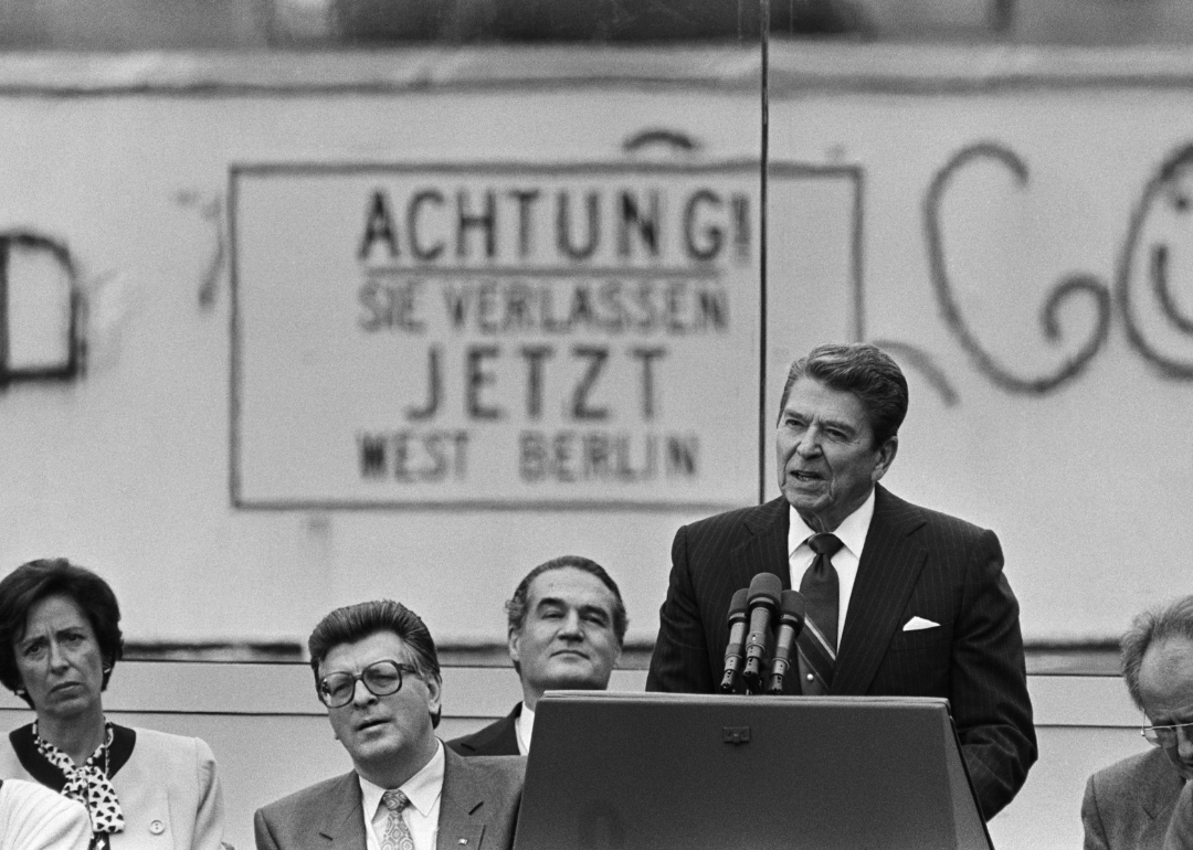 President Ronald Reagan speaking at the Berlin Wall.