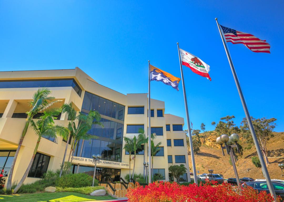 Pepperdine University with American, California, and Malibu flags waving.