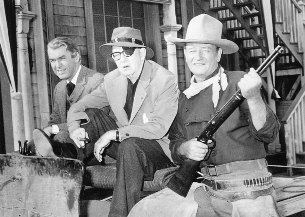 James Stewart, John Ford, and John Wayne on the set of 