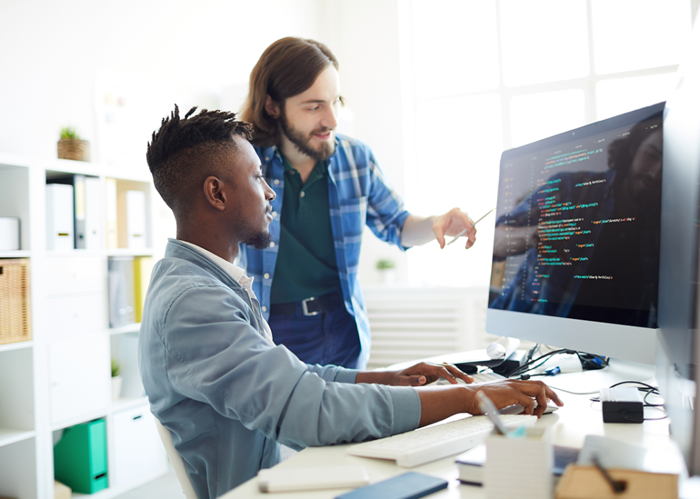 Development team working at desktop.