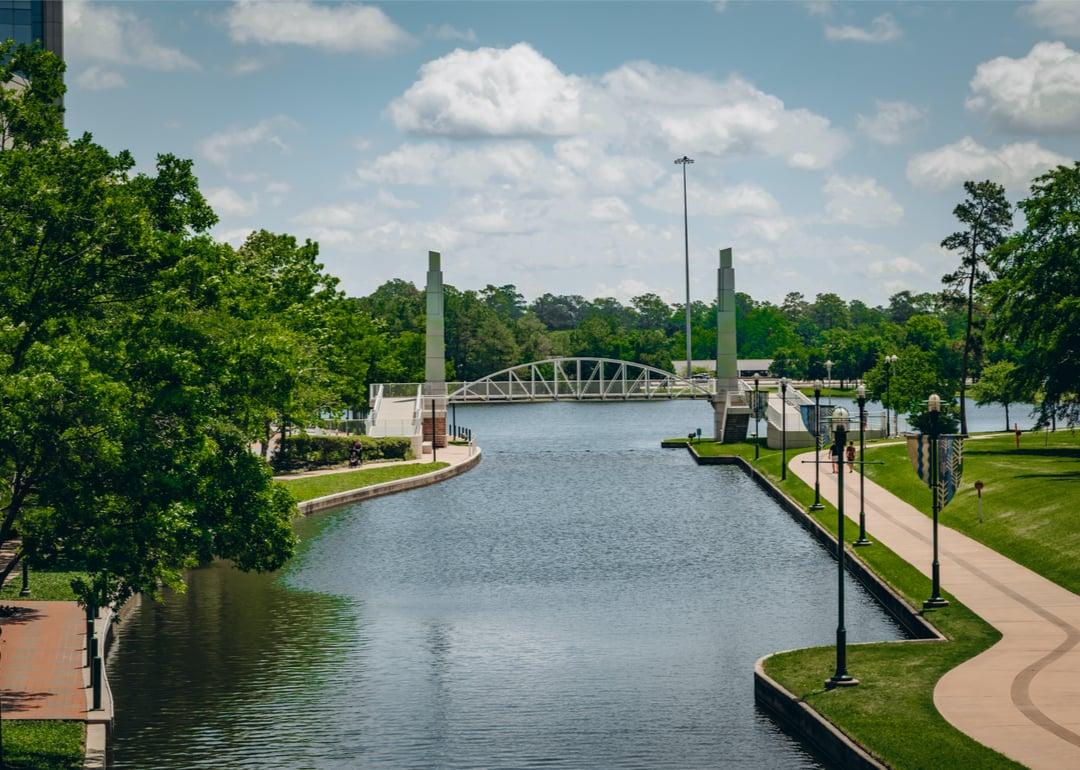 A view of a lake at a park in Shenandoah, Texas.