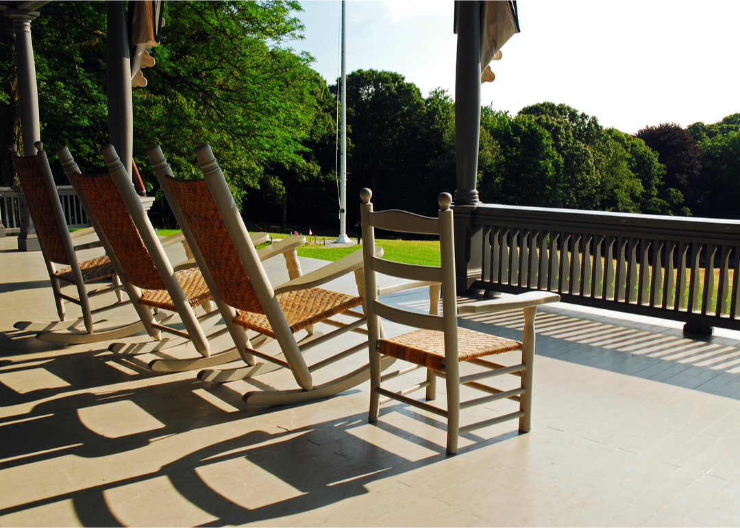 Porch with rocking chairs.