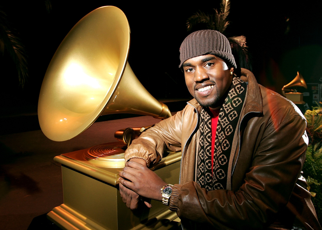 Kanye West poses after receiving 10 Grammy nominations.