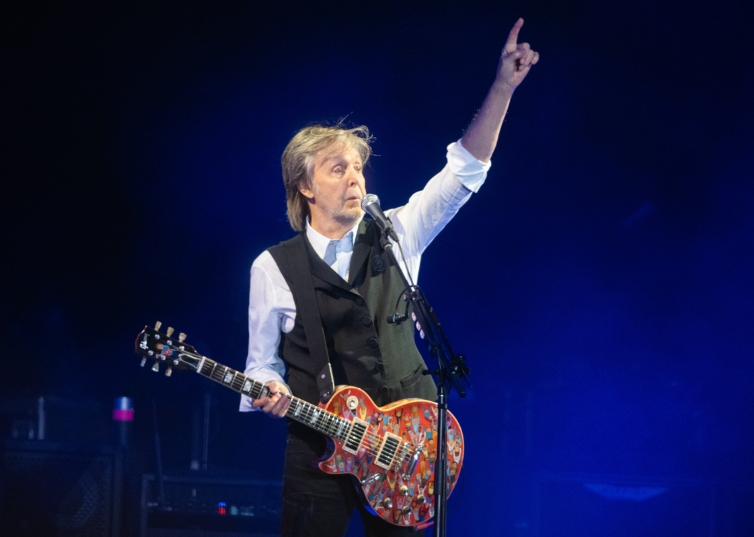Paul McCartney performs onstage.