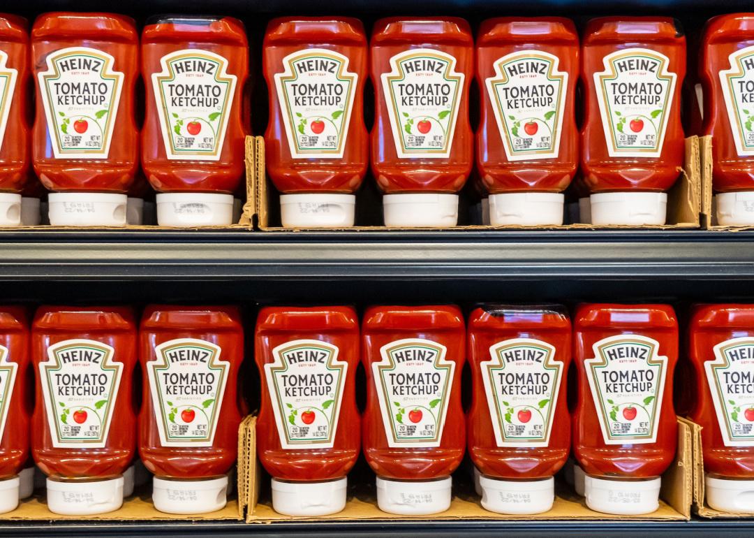 Plastic jars of Heinz Tomato Ketchup in supermarket.