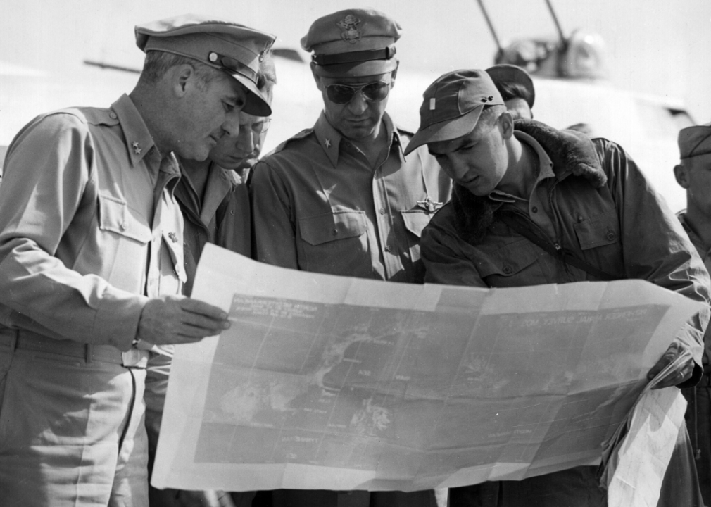 U.S. Army generals review a map in Corsica in August 1944.