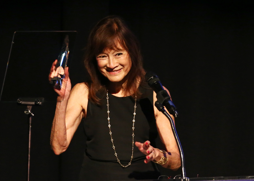 Freida Lee Mock accepts award at IDA Documentary Awards.