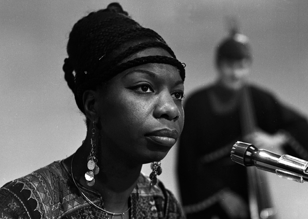 Nina Simone performing onstage.