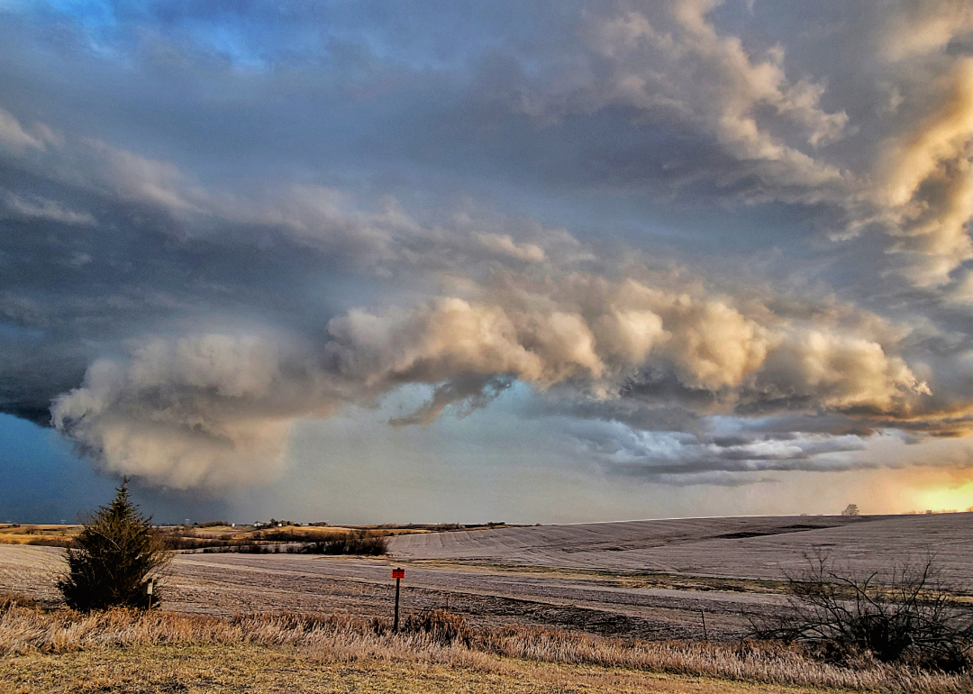 Dramatic sky over fields.