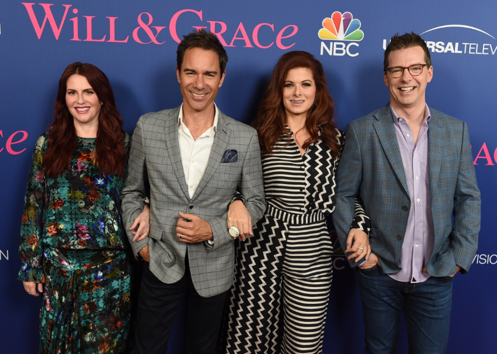 The cast of ‘Will & Grace’ pose at an event.