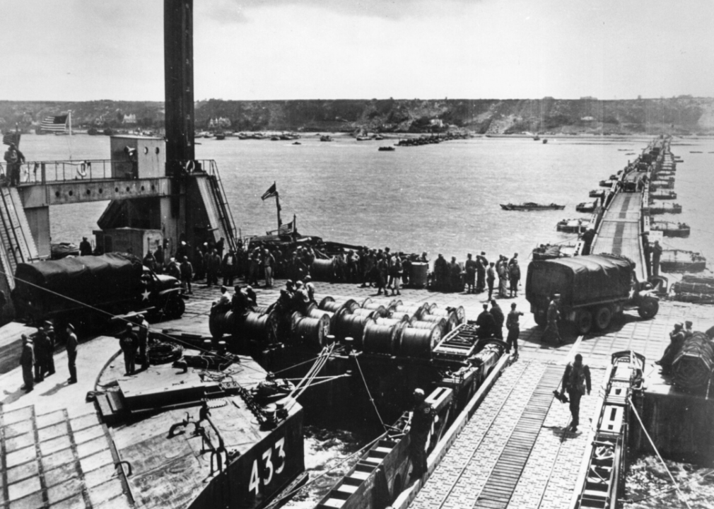 Allies unload supplies on a Mulberry Harbour at Colleville, France.