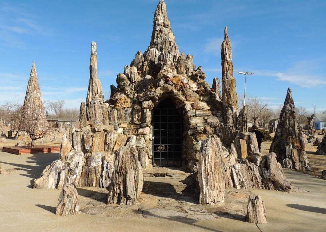 A petrified wood castle in the park.