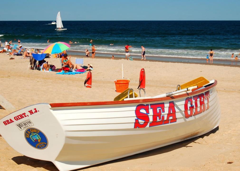 Beachgoers enjoy a summer's day.