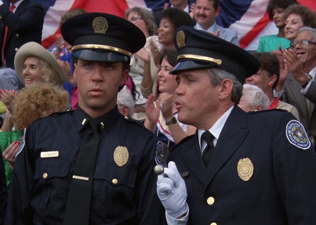 #7. Police Academy 5: Assignment: Miami Beach (1988) G.W. Bailey and Lance Kinsey in ‘Police Academy 5: Assignment: Miami Beach’.