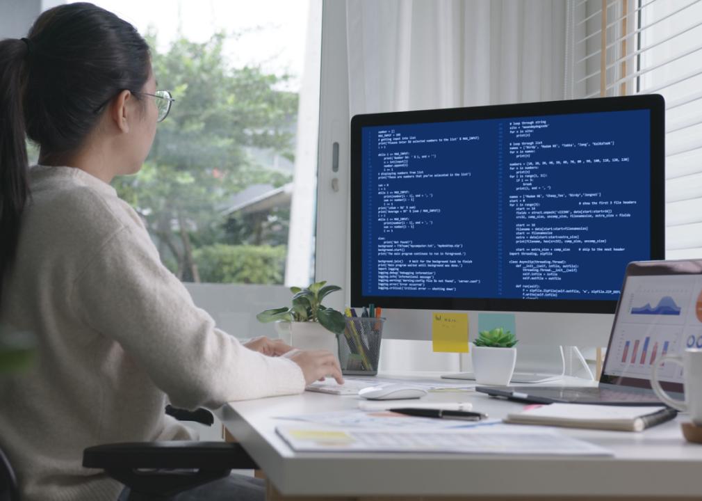 Data scientist programming code.
