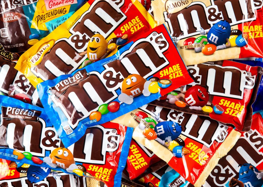 Variety of M&Ms milk chocolate candy packages.