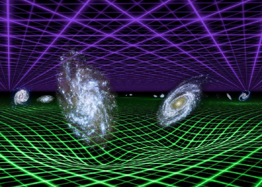 Artist's conception of dark energy represented by the purple grid, and gravity by the green grid below