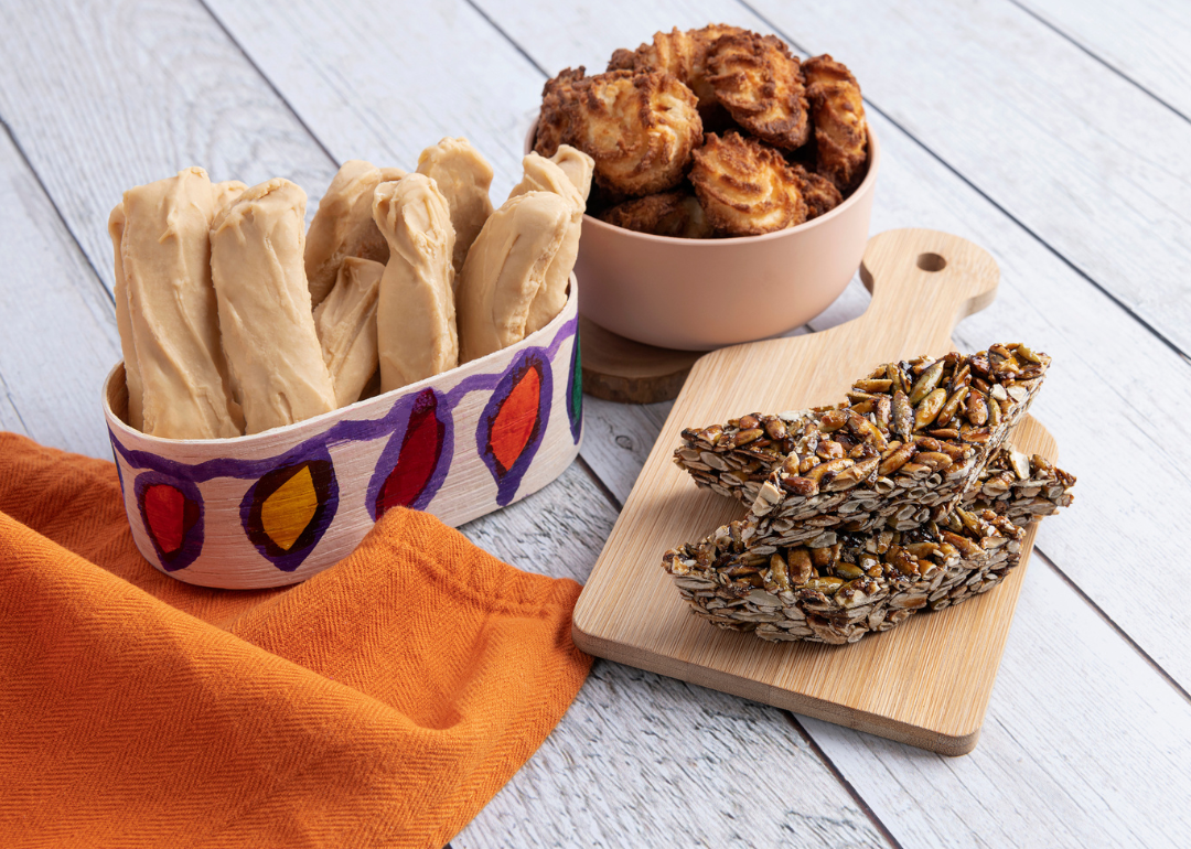 Selection of three types of Guatemalan treats on table, including palitos.