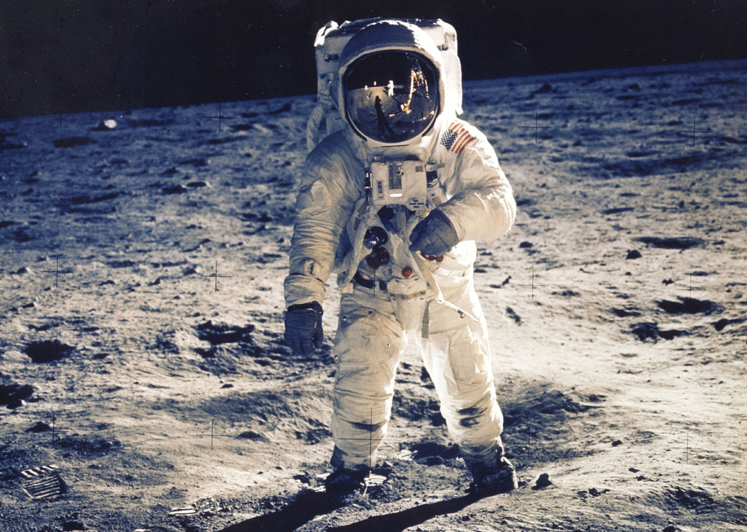 Edwin Aldrin Jr. walking on moon near Apollo 11.