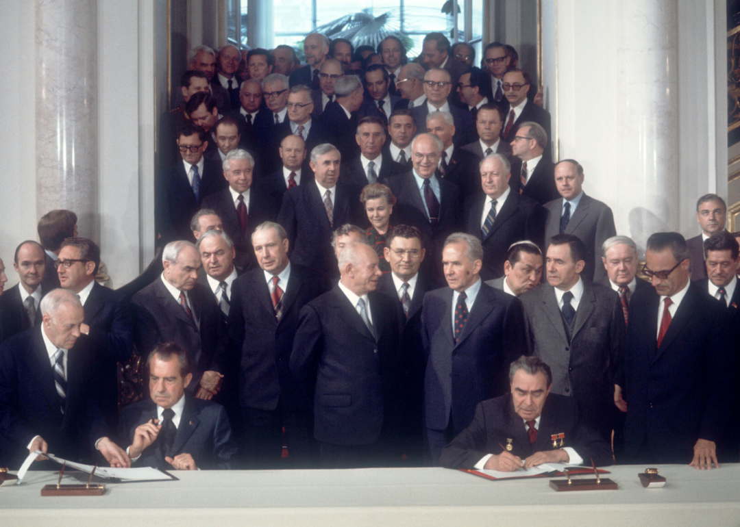 Richard Nixon and Leonid Brezhnev sign SALT treaty.