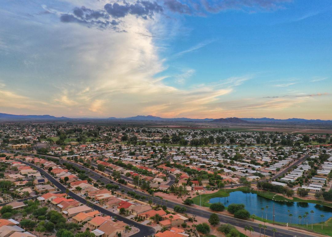 Aerial view of desert community at sunrise.