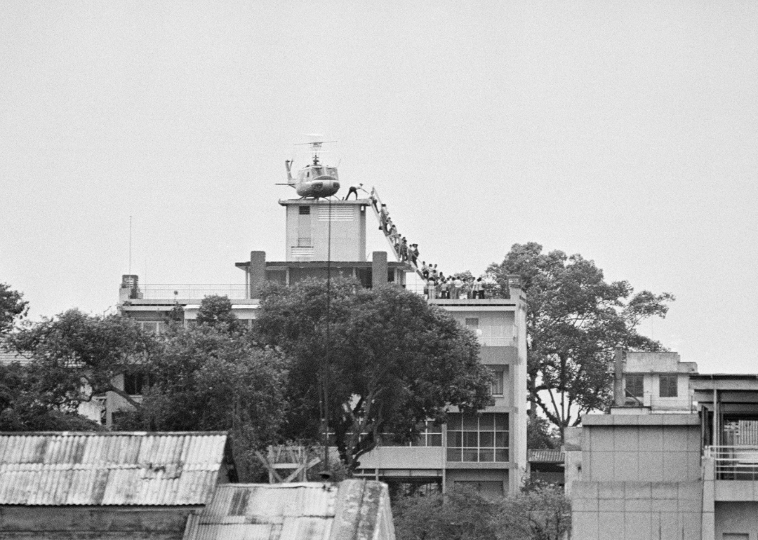 Helicopter evacuation of Vietnamese from rooftop in Saigon.