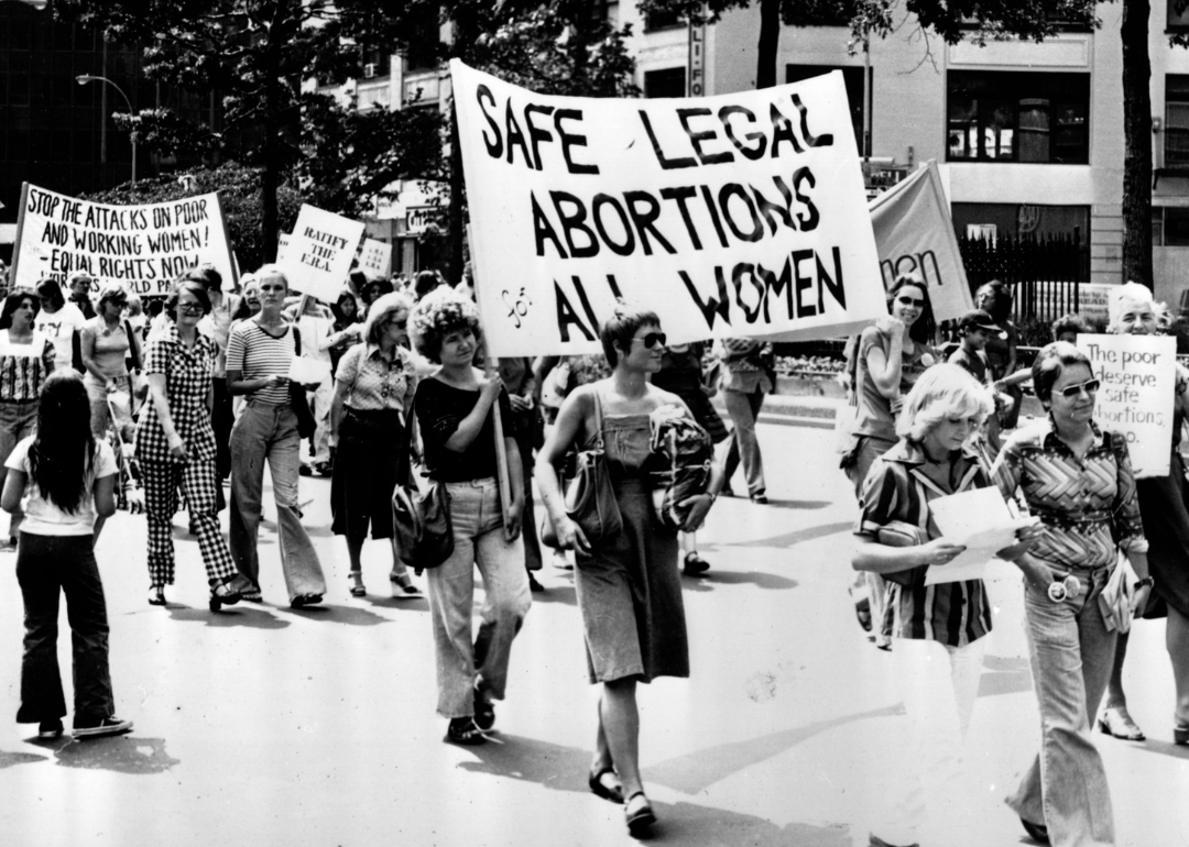 Women walk in a demonstration advocating “Safe legal abortions for all women”.