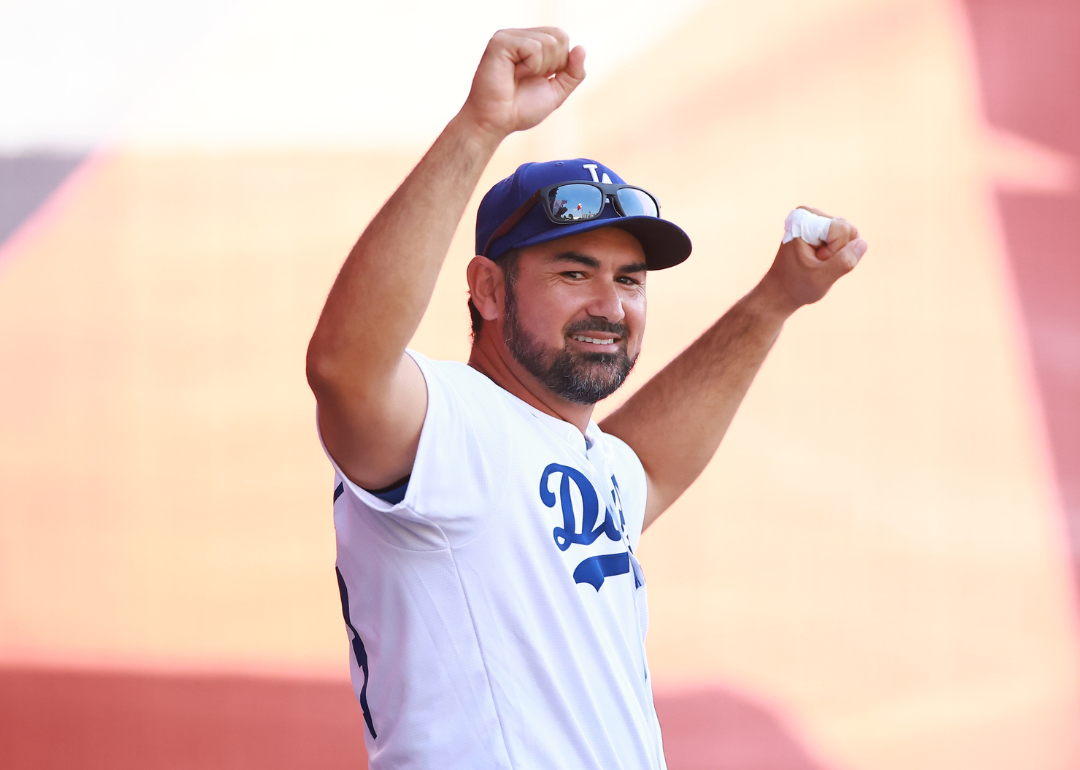 Adrián González cheers in a Dodgers uniform.