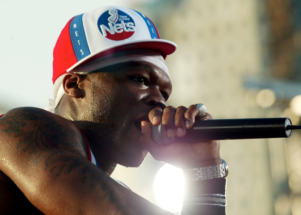 50 Cent performing onstage.