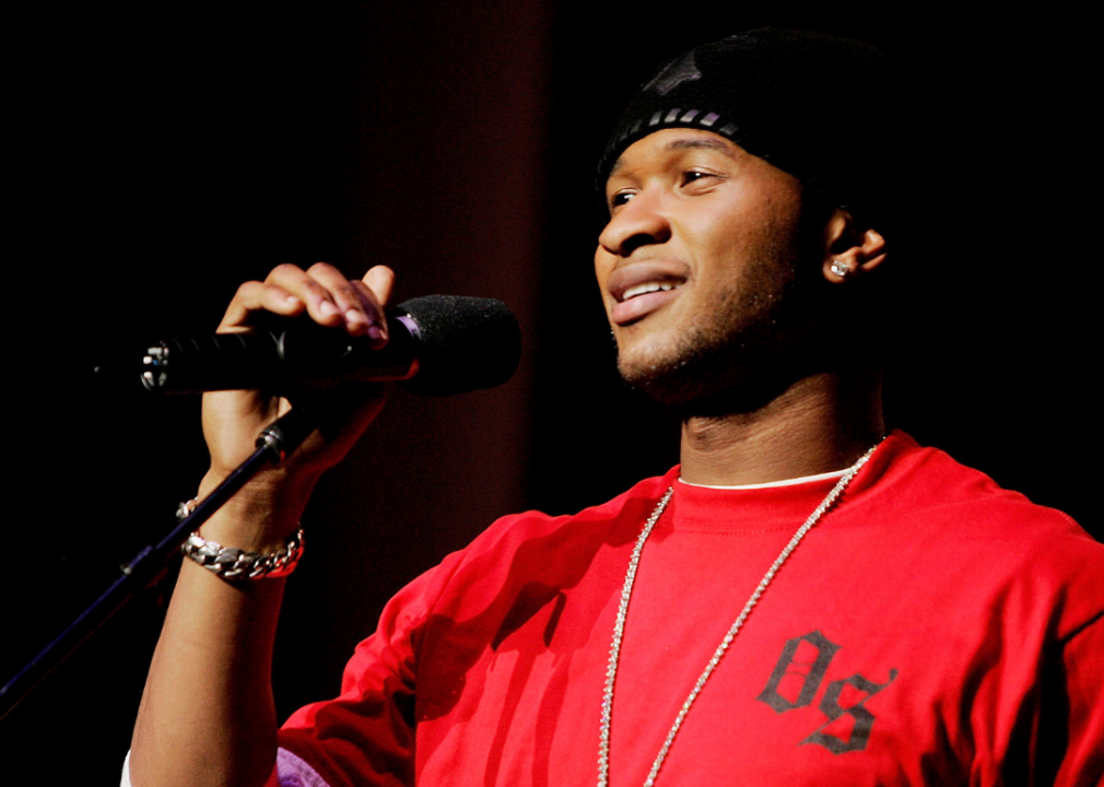 Usher with microphone onstage.