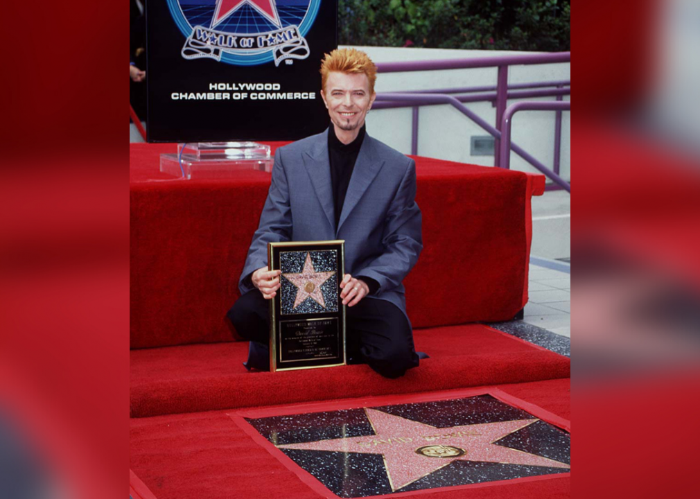 Bowie crouched down beside his star on the Hollywood Walk of Fame. 