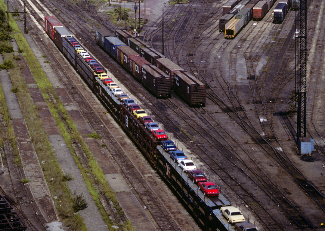 A 1978 train car loaded with different car models.