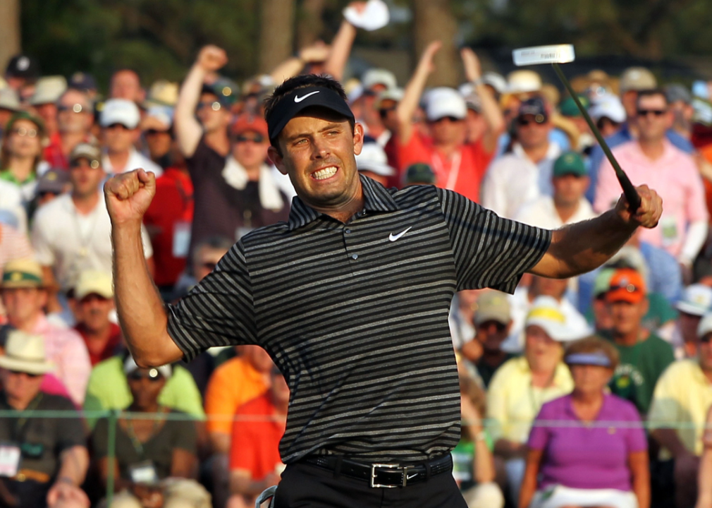 Charl Schwartzel of South Africa celebrates his two-stroke victory on the 18th green during the final round of the 2011 Masters Tournament.