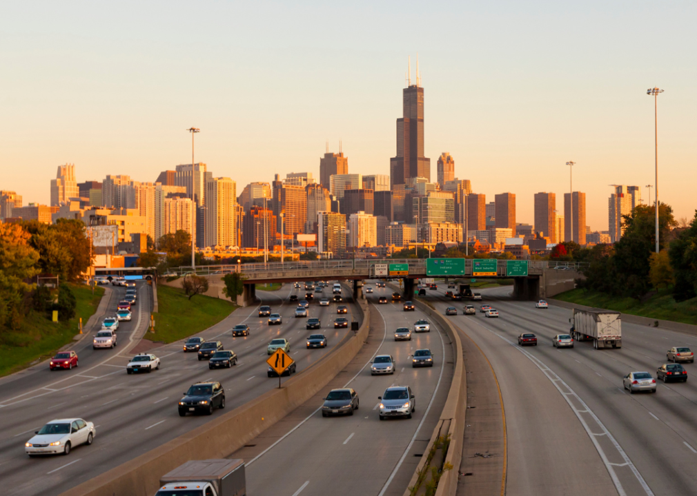 Chicago traffic at sunset with the skyline in the background.
