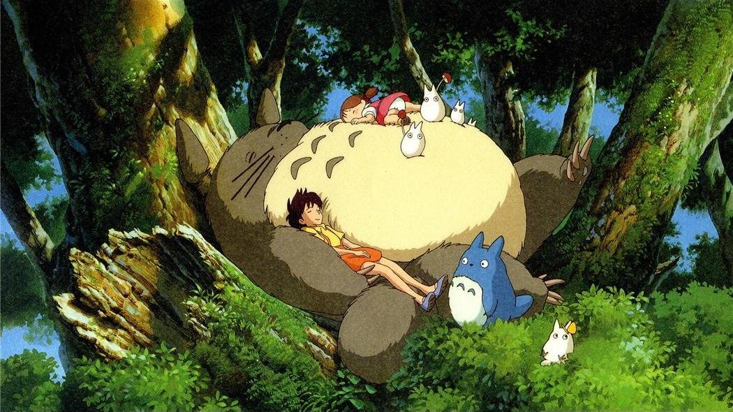 Kids sleeping on a round creature in the woods.