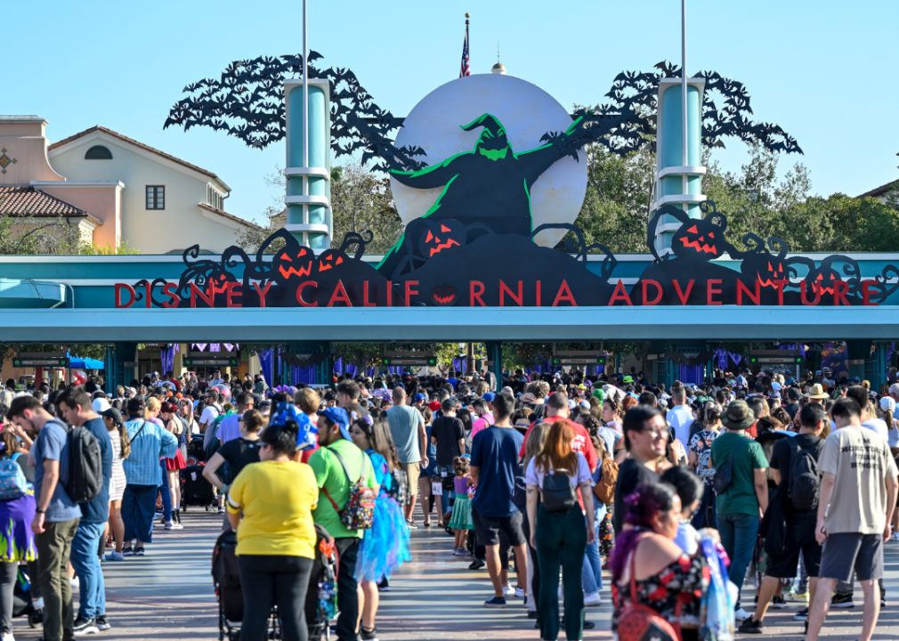 Guests line up to enter Disneyland Park.