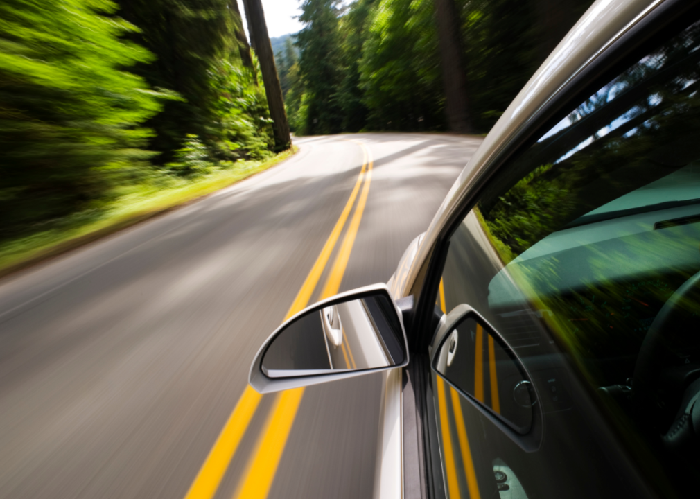 The states where people pay the most in car insurance premiums A blurry view of a fast moving car.