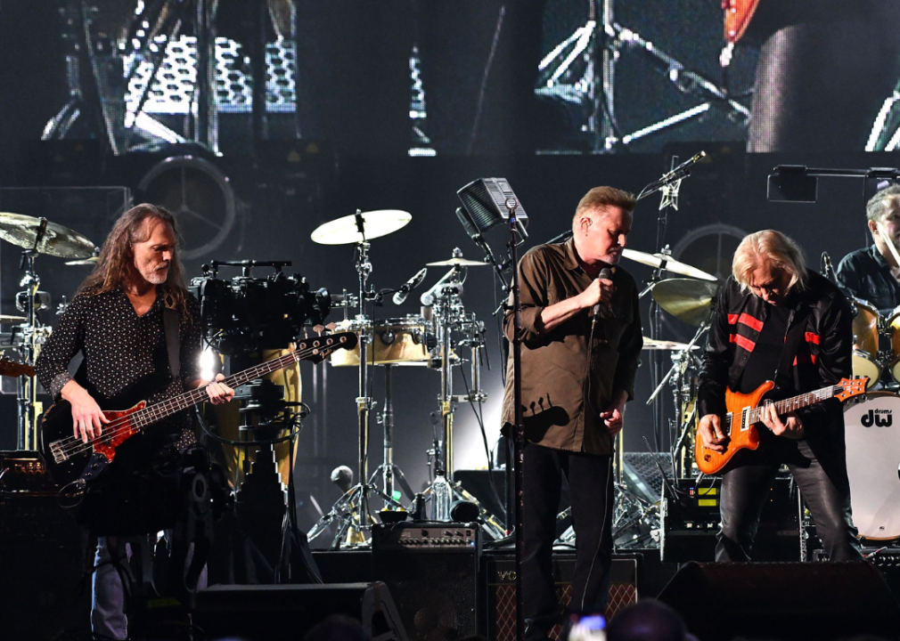Musicians Timothy B. Schmit, Don Henley and Joe Walsh of The Eagles perform onstage during 