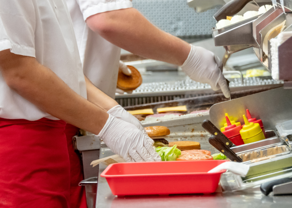 A close-up of fast-food workers