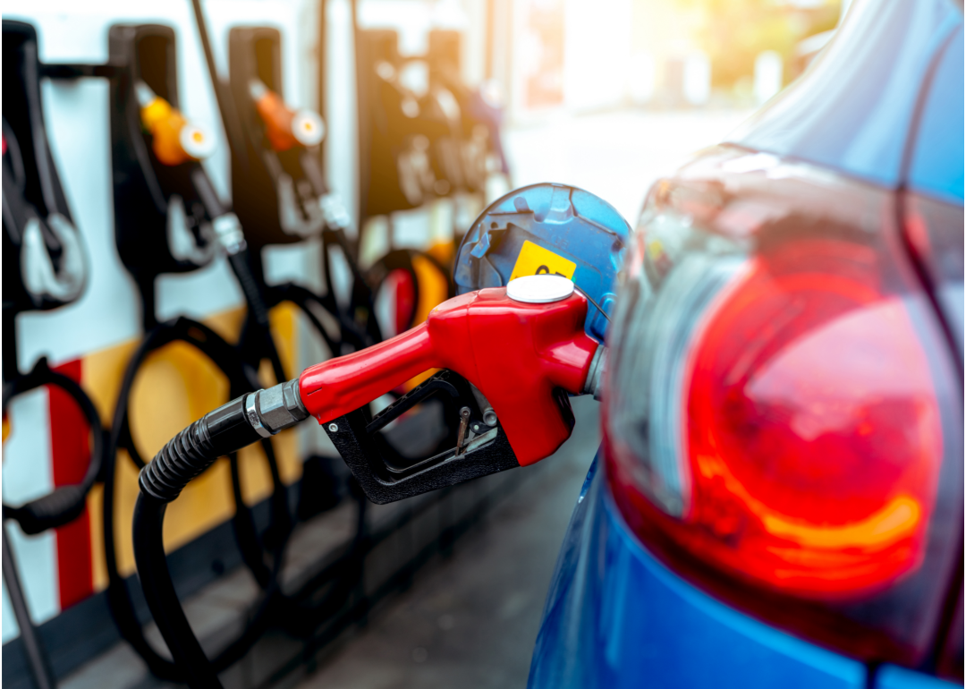 A car being refueled at a gas station