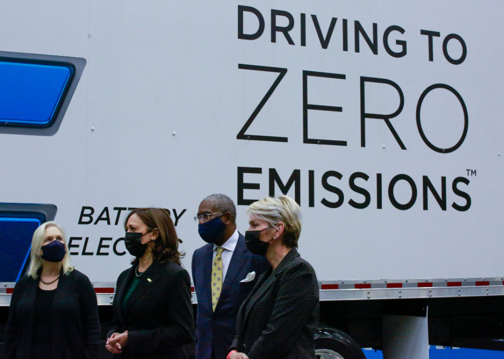 Senator Kirsten Gillibrand, Vice President Kamala Harris, Representative Gregory Meeks, and Secretary of Energy Jennifer Granholm, standing next to a heavy-duty electric truck with the words, driving to zero emissions.