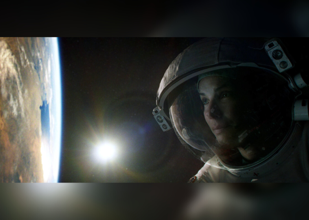 Sandra Bullock floats in space with Earth in the distance