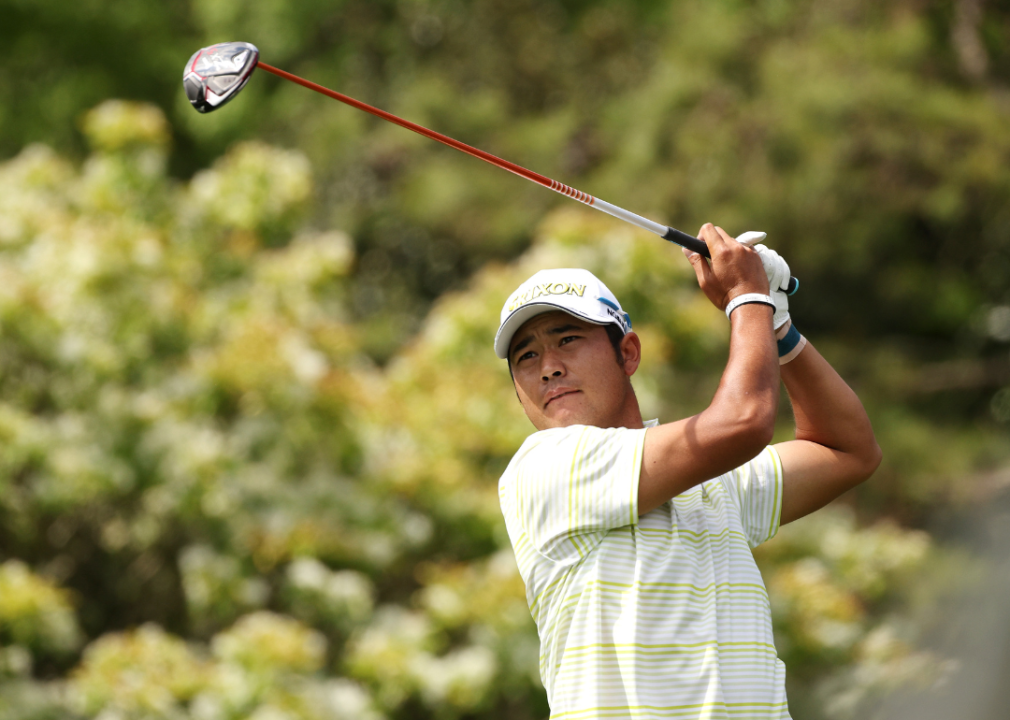 Hideki Matsuyama of Japan takes his shot from the fifth tee during the final round of the Masters at Augusta National Golf Club in April 2021 in Augusta, Georgia.