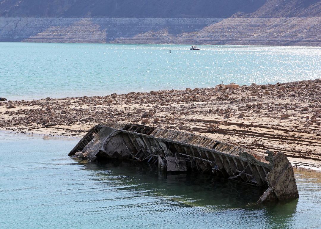 A sunken World War II-Era landing craft is revealed near the Lake Mead Marina as the waterline lowers.