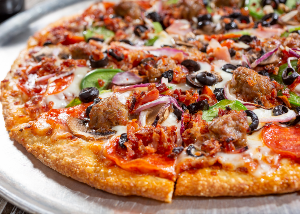 Supreme pizza loaded with toppings.