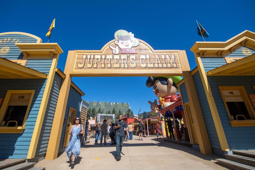 People walking through Jupiter's Claim at Universal Studios.